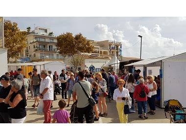 El port de Cala Rajada s’omple de gent i de llampuga cuinada